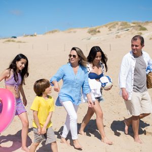 family going to the beach in the summer in Connecticut